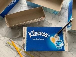 DIY crafting a desk organizer with Kleenex tissue boxes step 1
